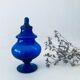 Blue glass apothecary shaped bottle