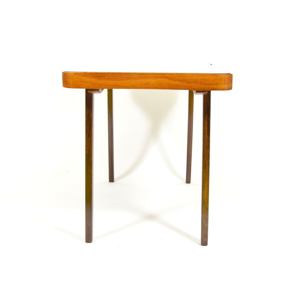 With 70 years black glass coffee table