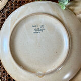 Set of four vintage stoneware plates