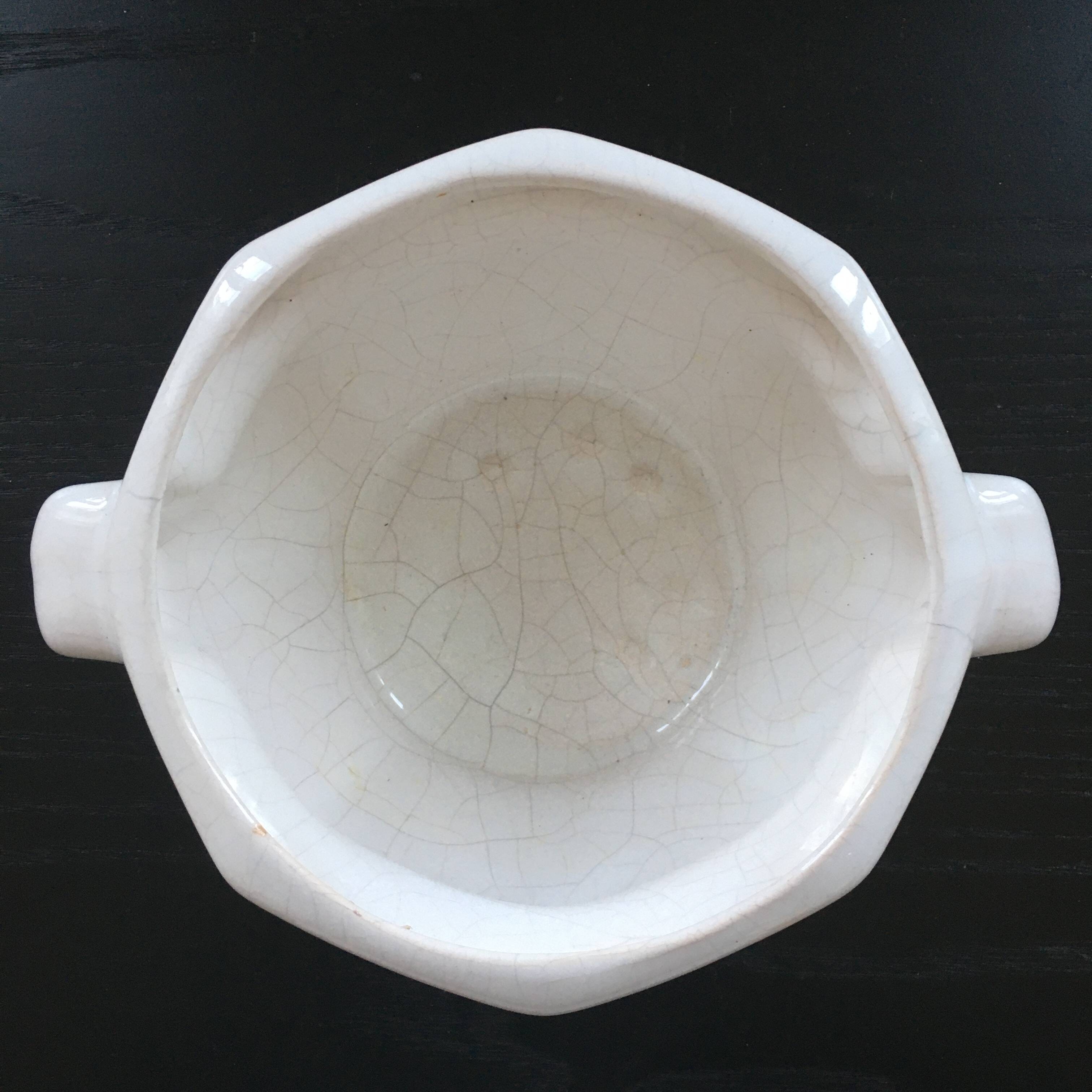 Cracked earthenware planter