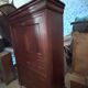 Secretary desk with mahogany and flame veneer.