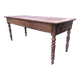 Antique farmhouse table in solid cherry wood with 2 drawers and 1 pull-out at the end with turned legs.