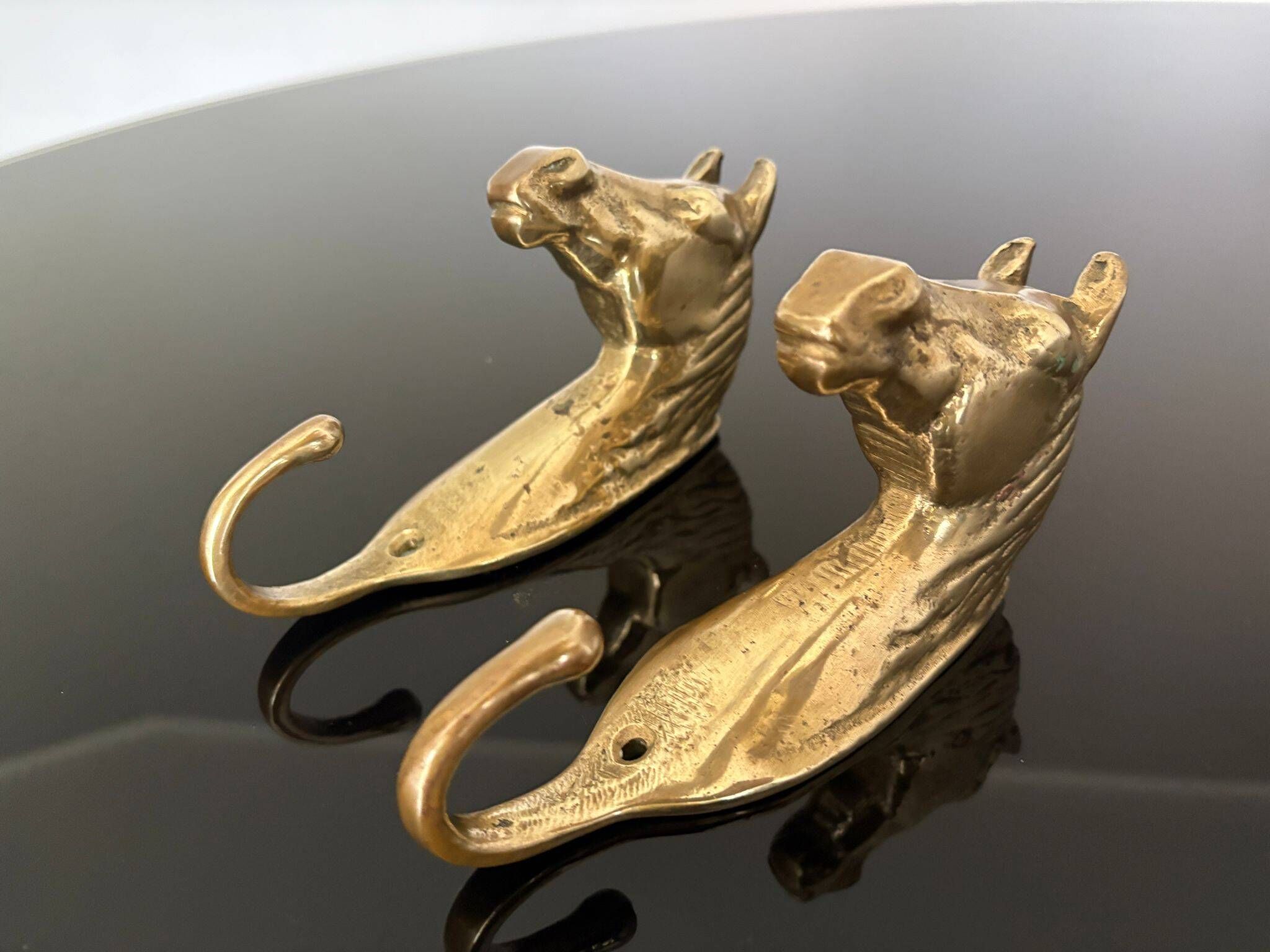 Pair of bronze coat hooks - Italy, 1950s