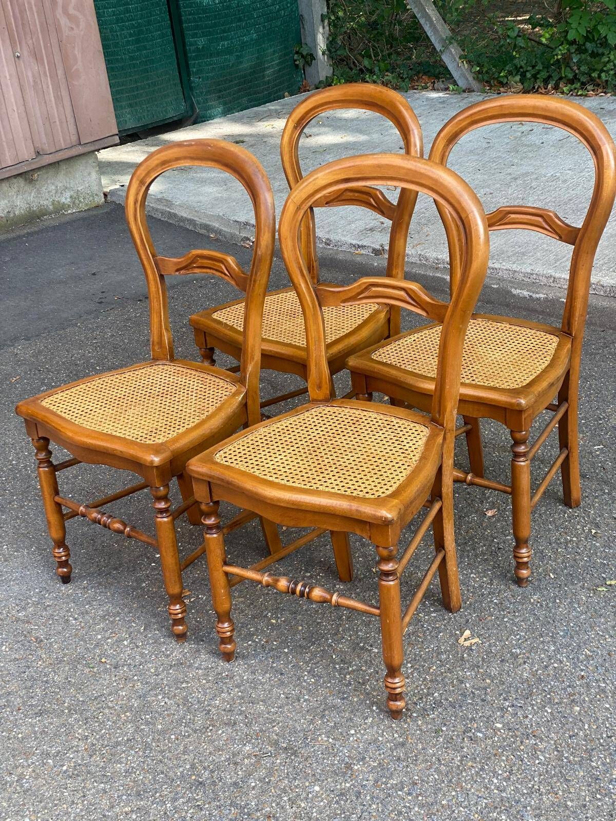 Set of 4 Louis-Philippe medallion chairs in wood with caned seats, 1970s.