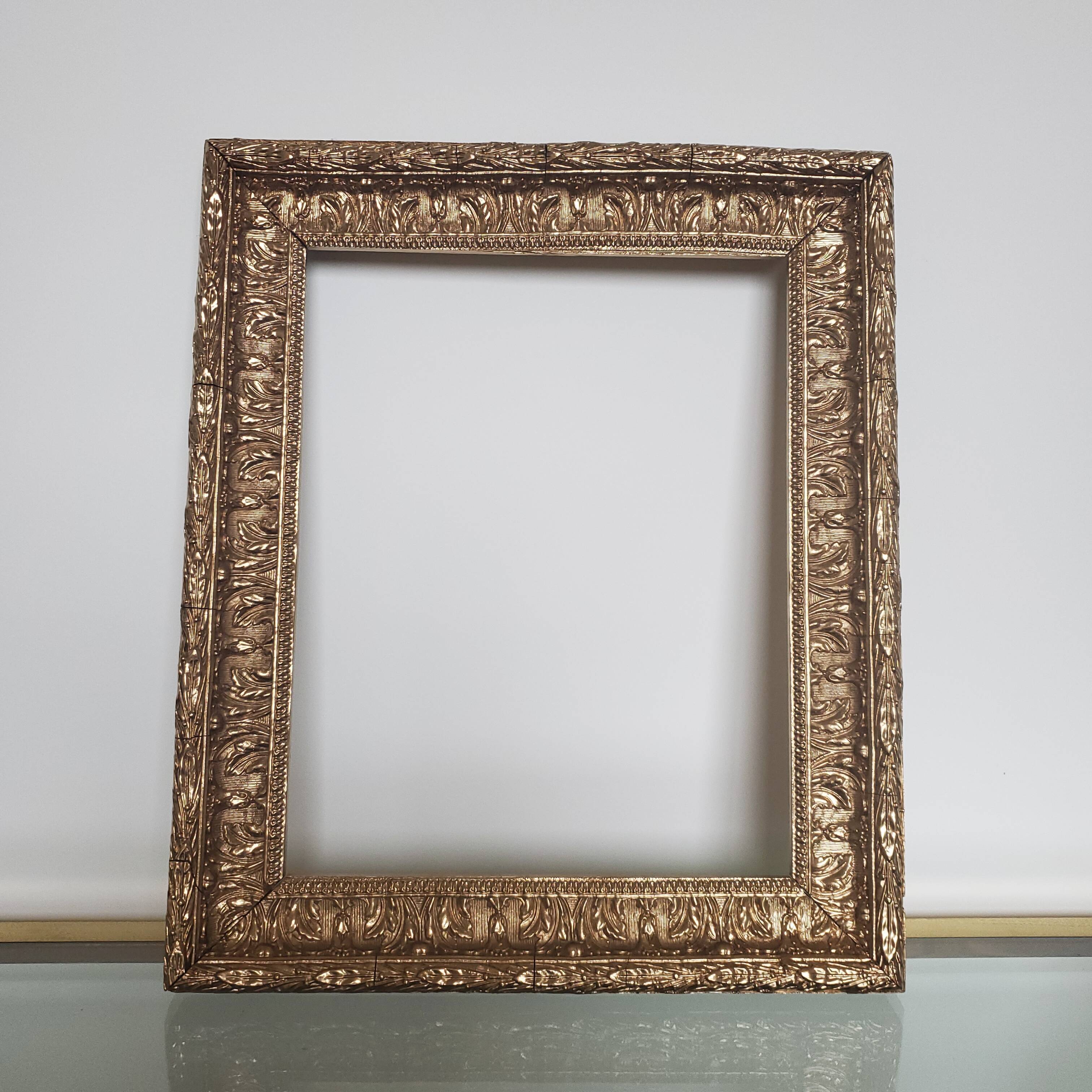 Old gilded carved wooden frame