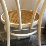 Couple of white bistro chairs