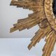 Convex sunburst mirror in carved and gilded wood, 1950s