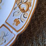 Old painted earthenware dish