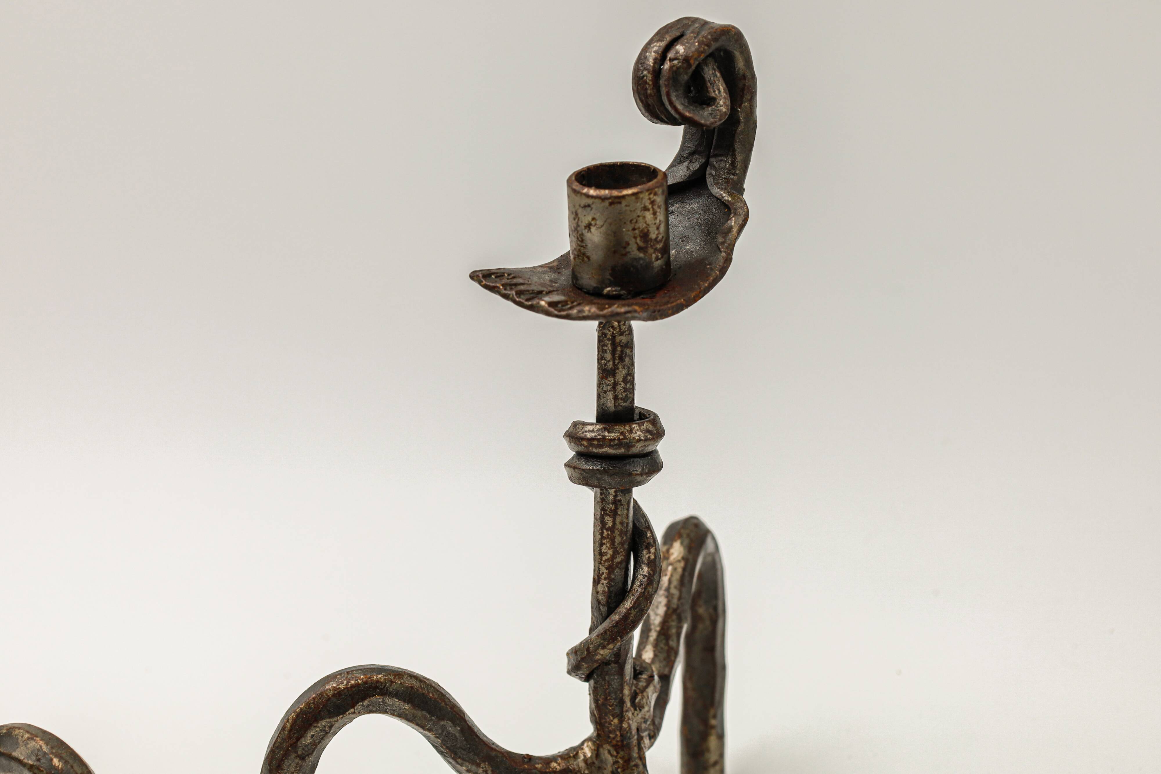 Pair of brutalist wrought iron candlesticks, French work, 1950s-1960s