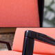 Fauteuil orange et noir scandinave restauré