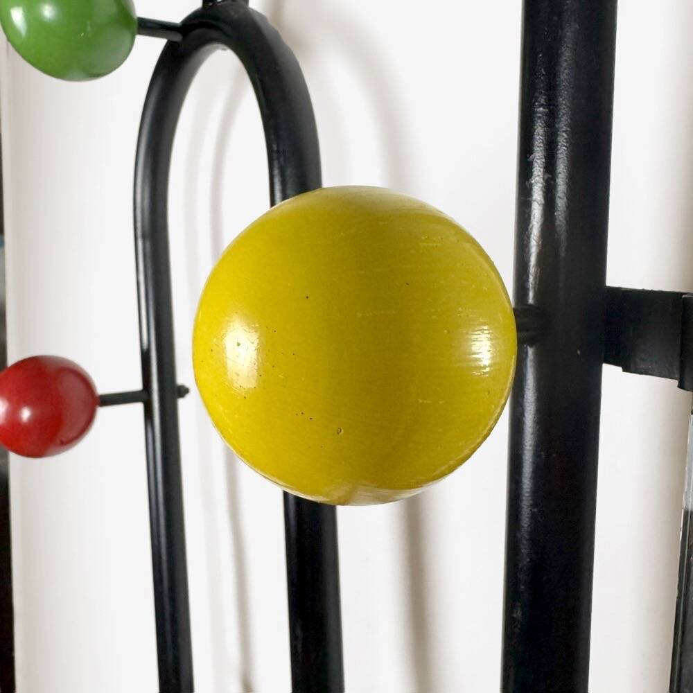 Metal coat rack with wooden balls and scoubidou from the 1960s.