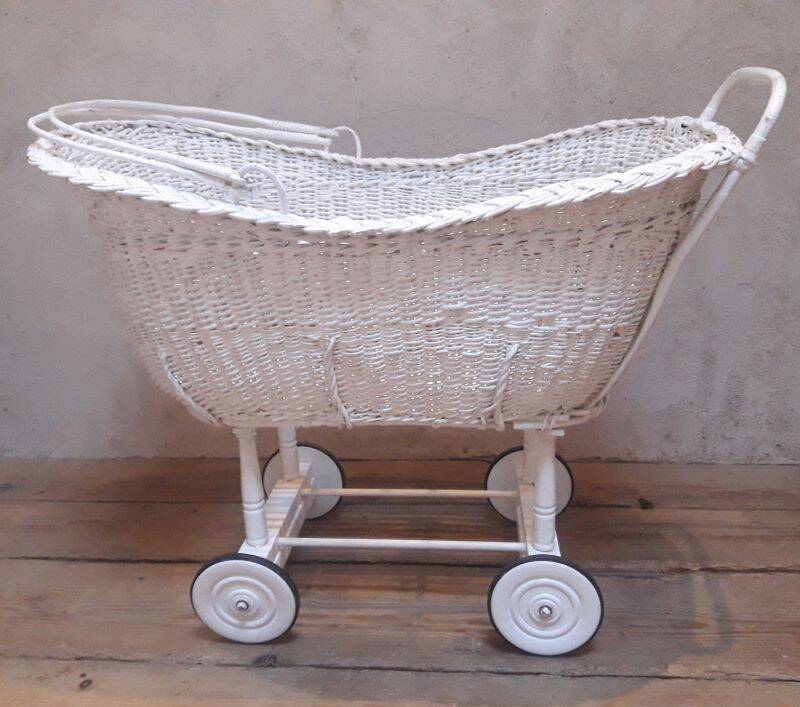 Wicker and painted wood baby cradle