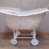 Wicker and painted wood baby cradle