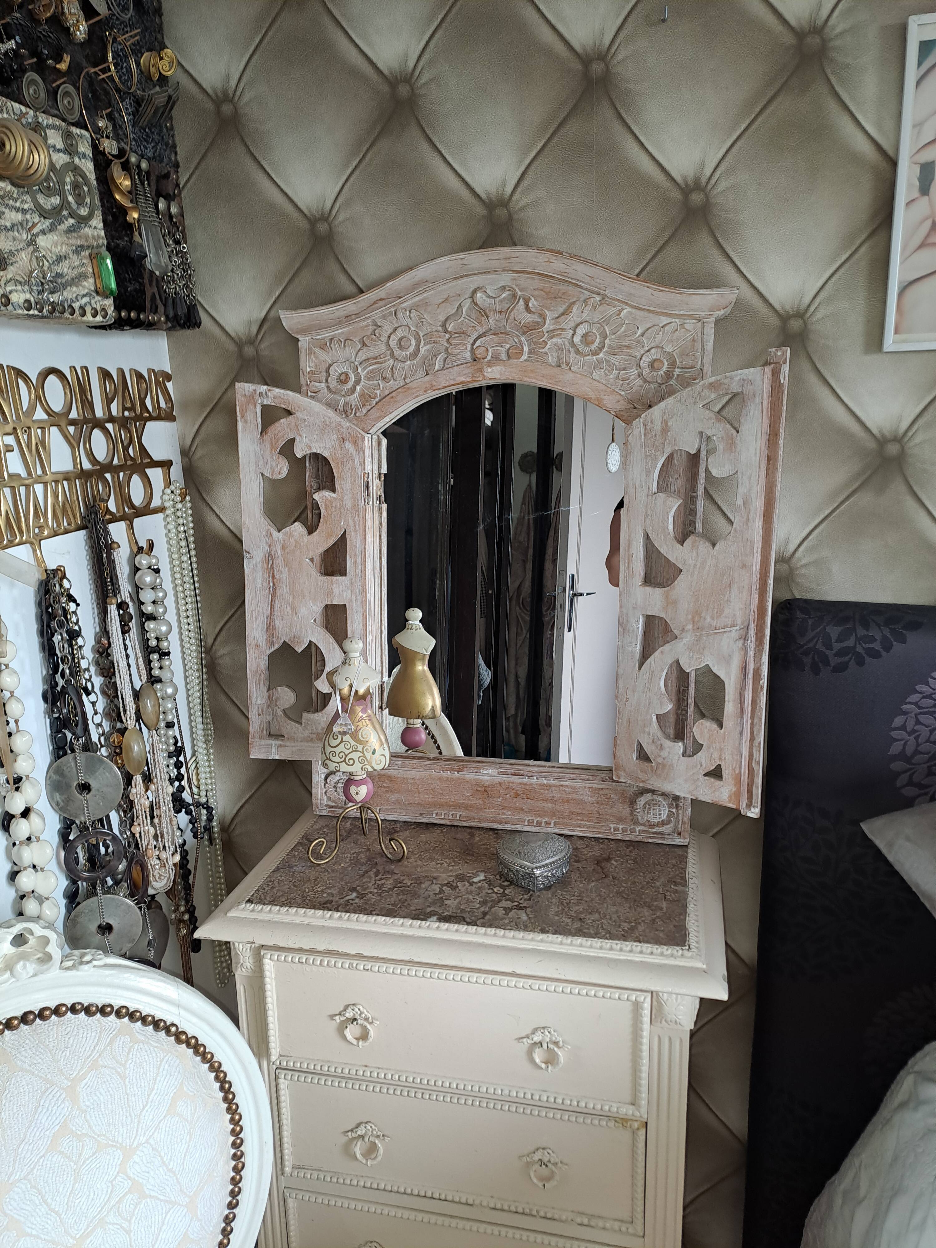 Carved white wood mirror 1990 decorative carved with opening shutters on a square mirror