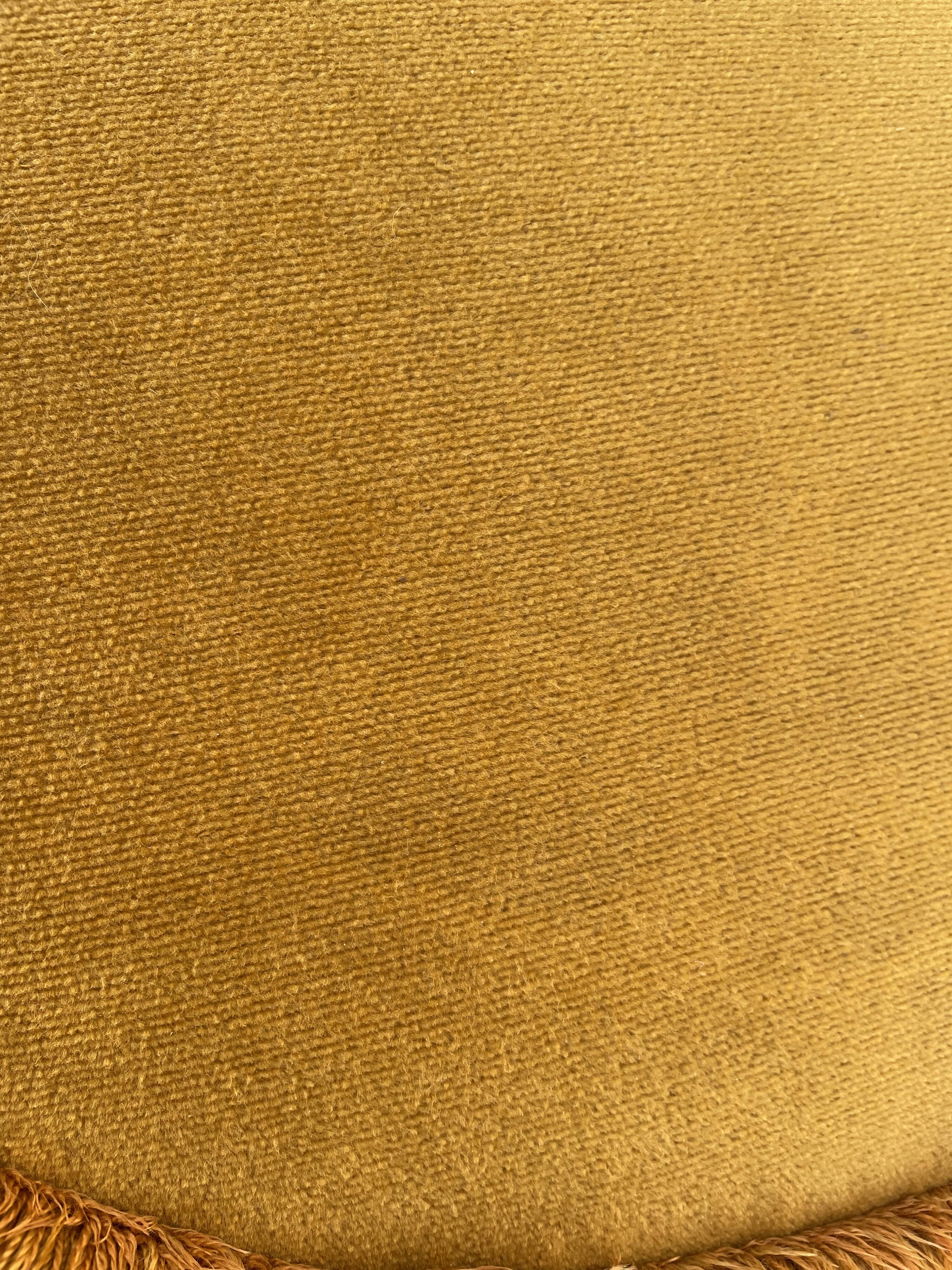 Golden yellow velvet pouf