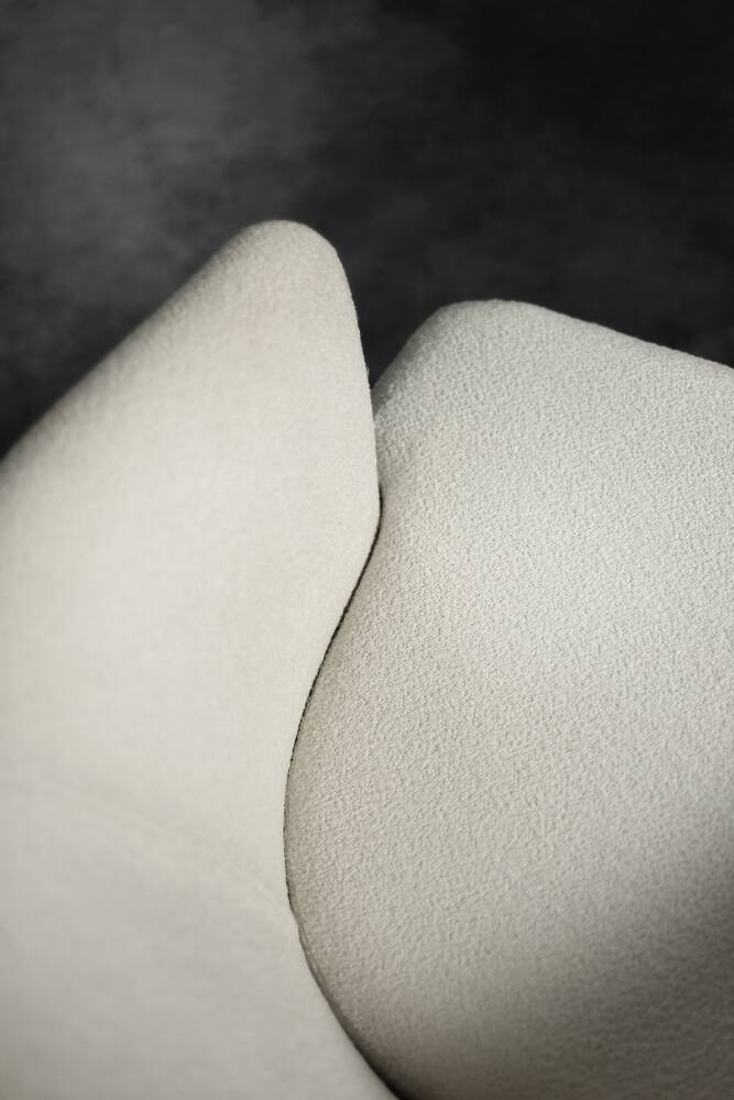 Low oak armchair with modern mid-century Scandinavian fabric and rounded backrest, 1960s.