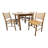 Danish ensemble transformable table 114 cm / 154 + 4 modernist chairs from the 1970s.