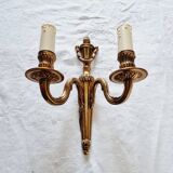French Empire-style wall sconce or chandelier in bronze with an antique gold patina.