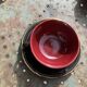 Coffee service composed of 5 cups and saucers in black earthenware and different colored interiors