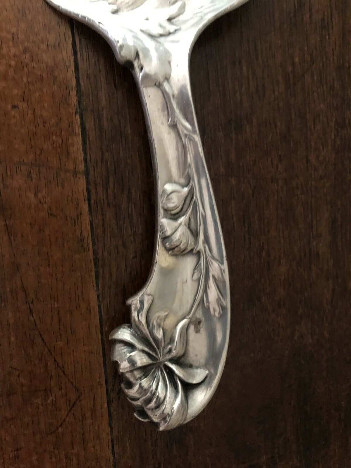 shovel picks up silver table crumbs