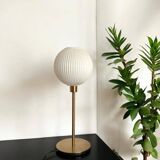 Table lamp with a lampshade from an old vintage pendant light in ribbed white glass and a pi