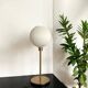 Table lamp with a lampshade from an old vintage pendant light in ribbed white glass and a pi