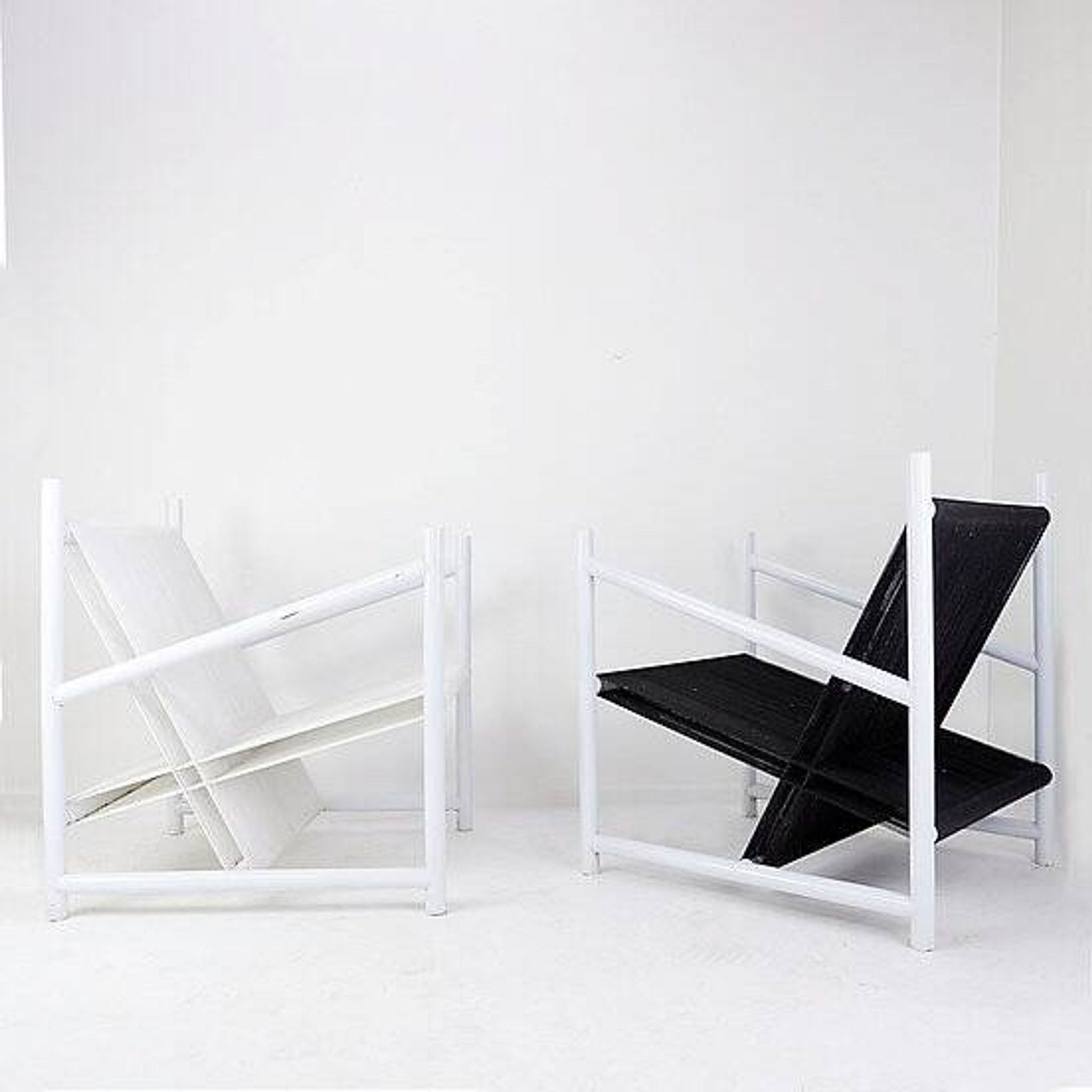 Indoor/Outdoor pair of Black/White Armchairs