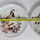 Set of six porcelain plates decorated with birds from Sologne, Limoges, signed, 25 cm