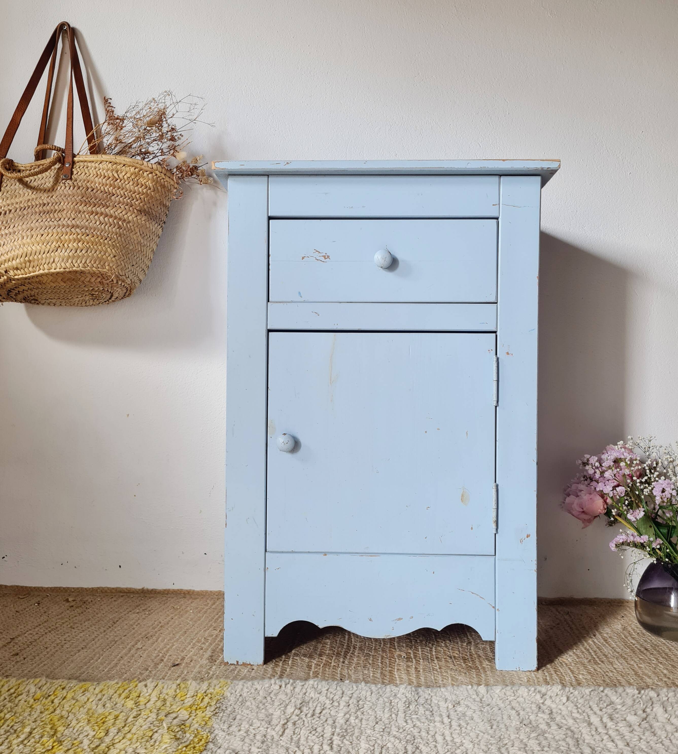 Handcrafted blue chest of drawers.