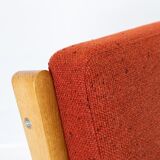 Easy chair in oak red wool fabric designed by Hans J. Wegner and manufactured by Getama in the 1960s