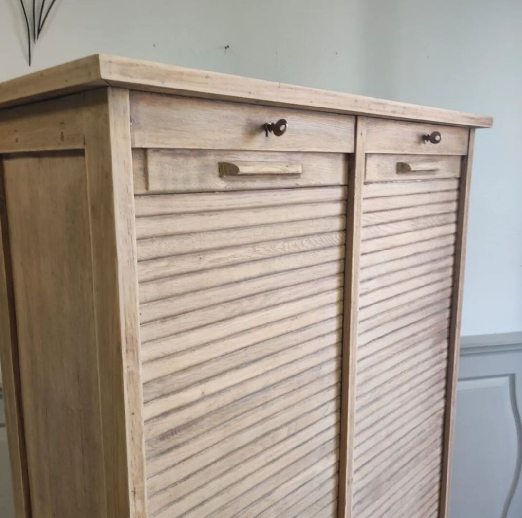 Antique furniture with double curtains sanded to white