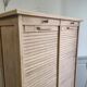 Antique furniture with double curtains sanded to white