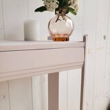 Small renovated Art Deco console in nude colour.