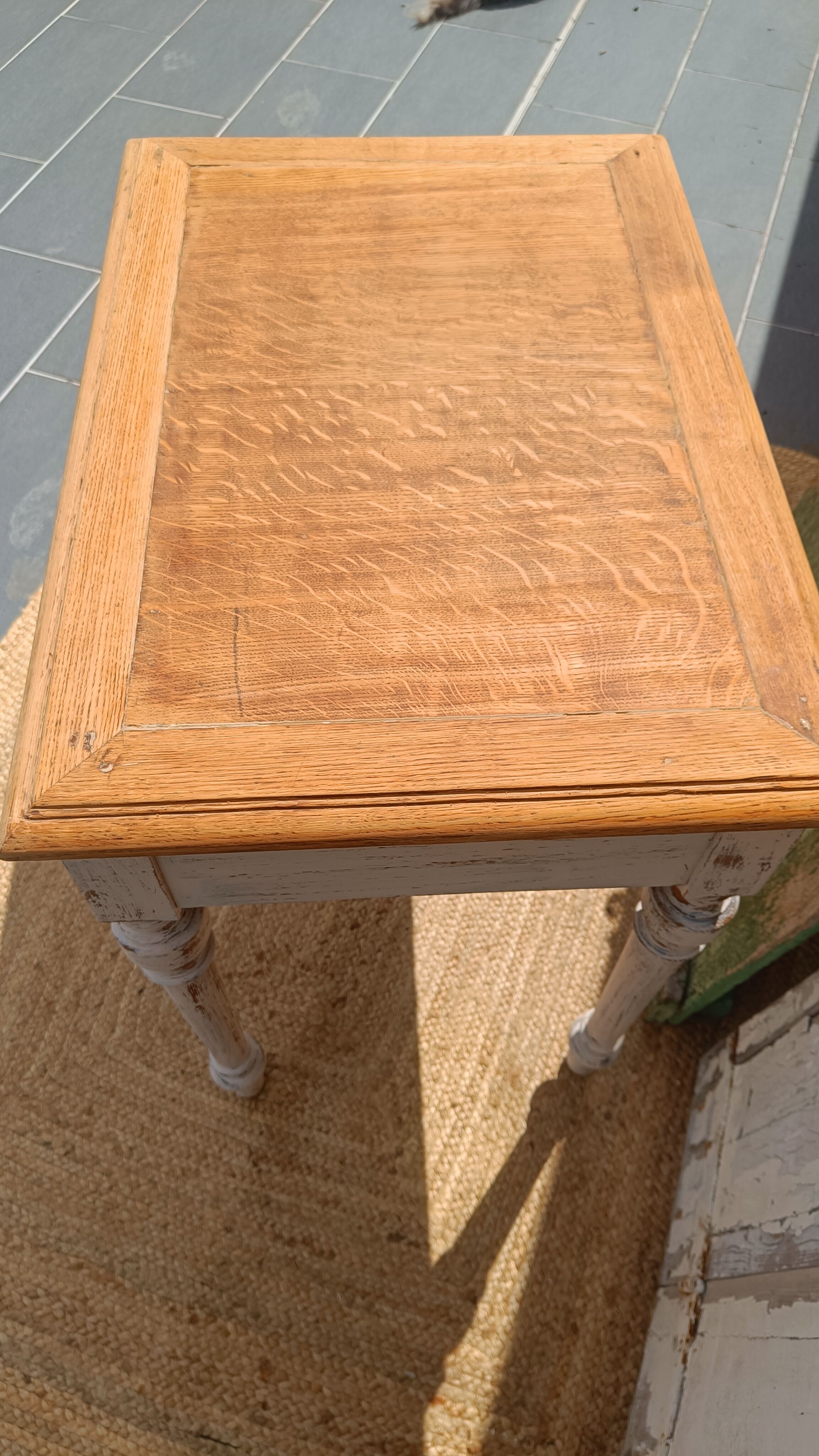 Antique drawer table with a patina.