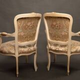 Pair of Louis XV style armchairs – Carved, gilded wood and brocade fabric