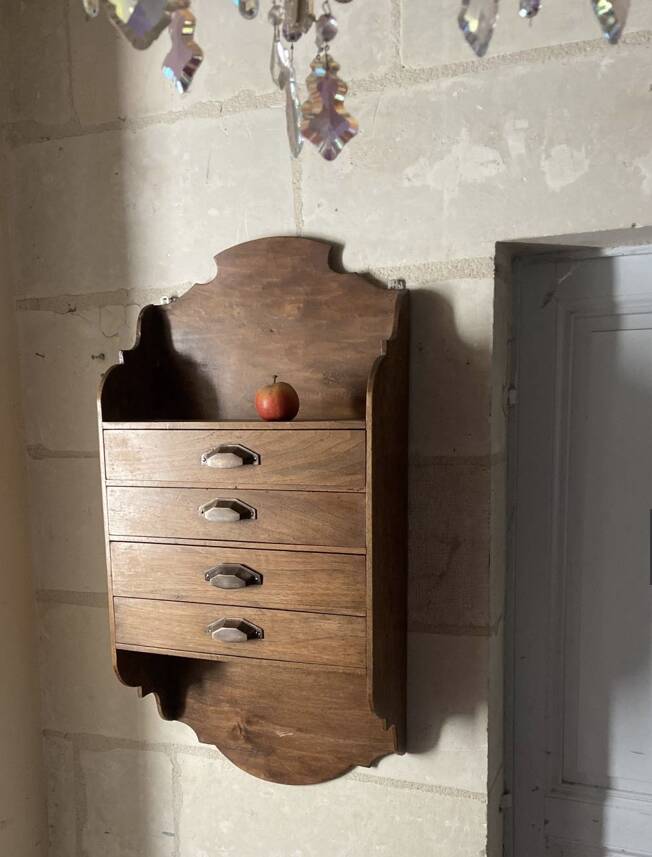 Antique piece of furniture with walnut drawers to hang