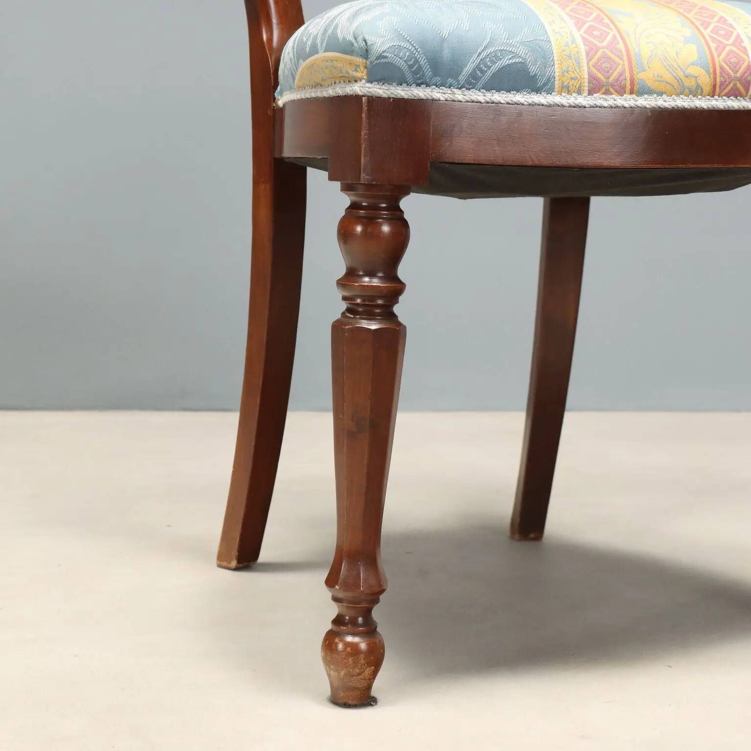 Antique walnut chairs with curved legs, Italy, mid-19th century.