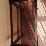 Rolling cabinet with 3 colored glass shelves
