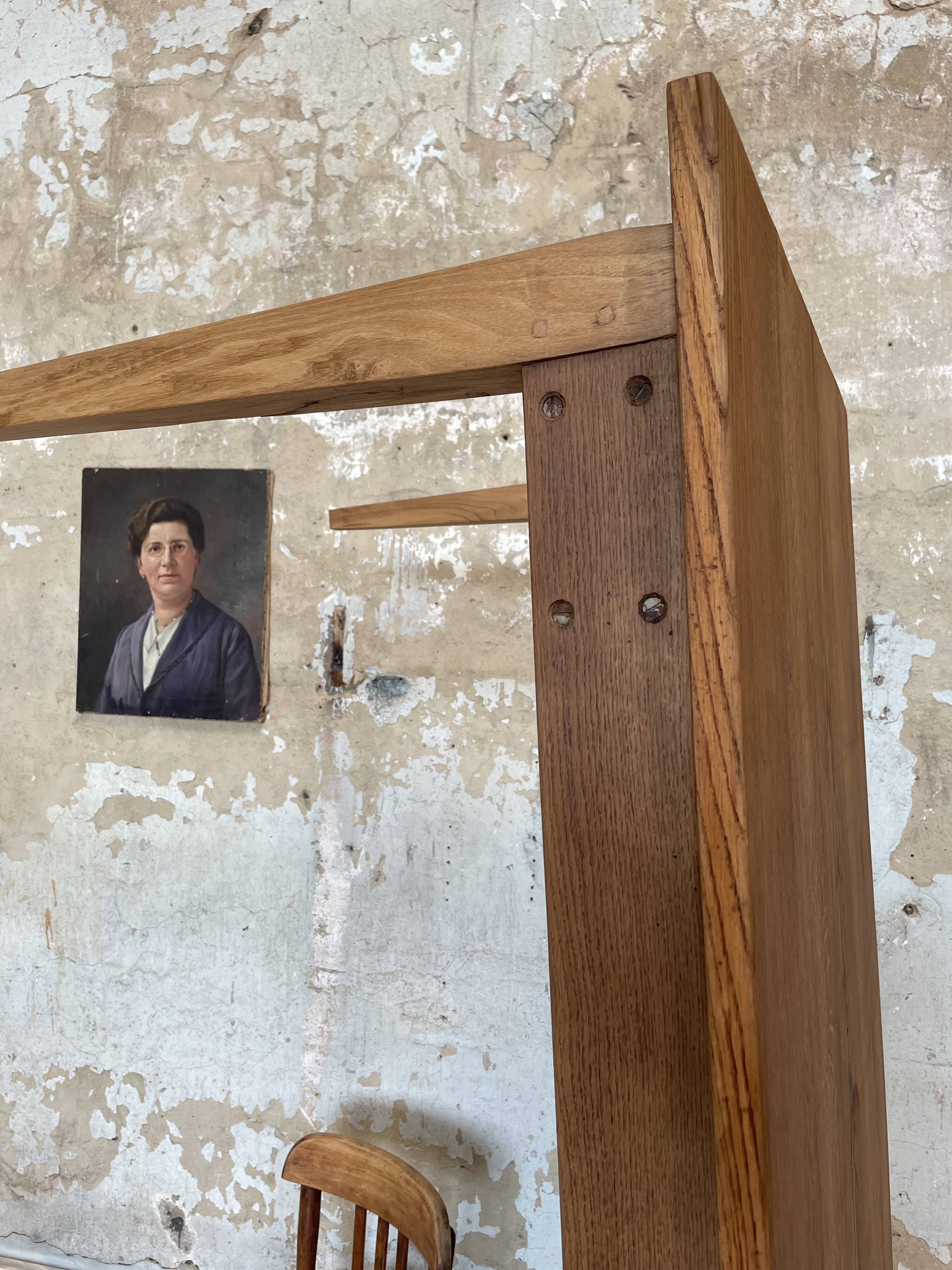 Vintage farm table with spindle legs.
