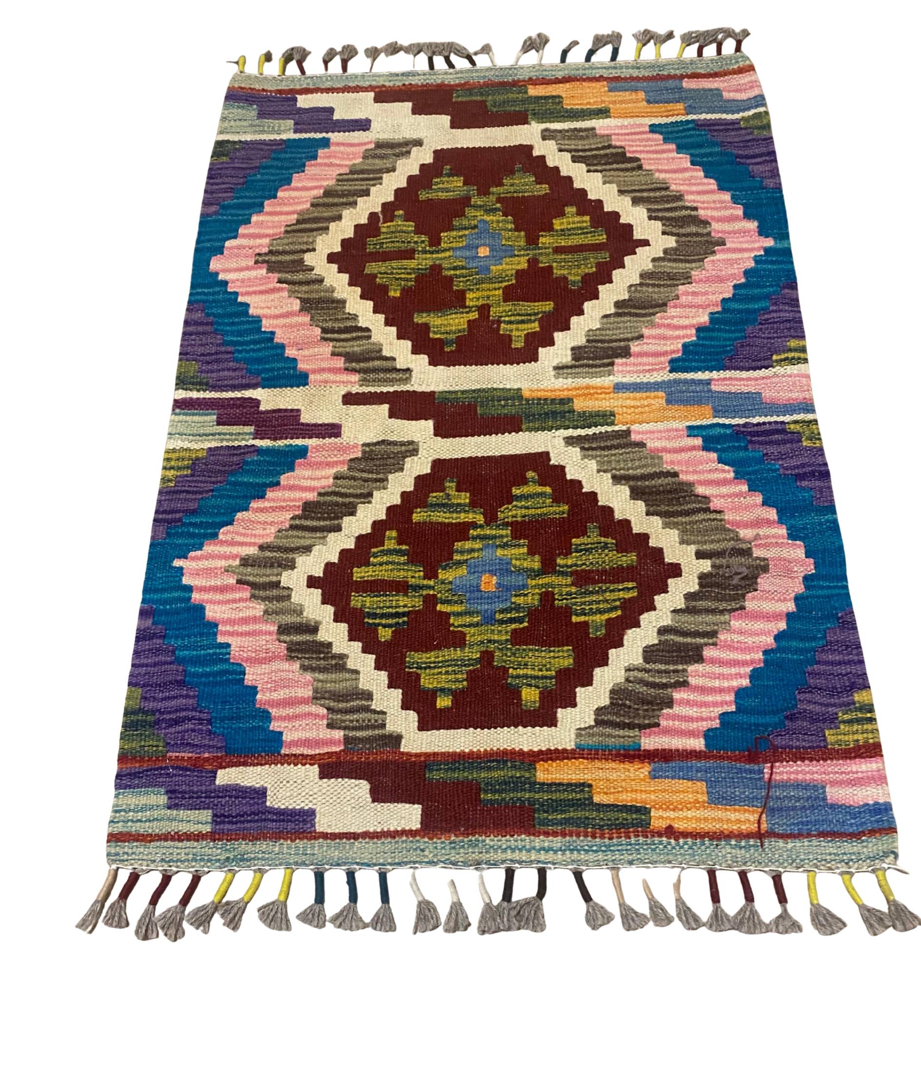 Afghan kilim rug in wool, pastel geometric patterns,