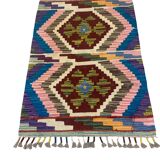 Afghan kilim rug in wool, pastel geometric patterns,