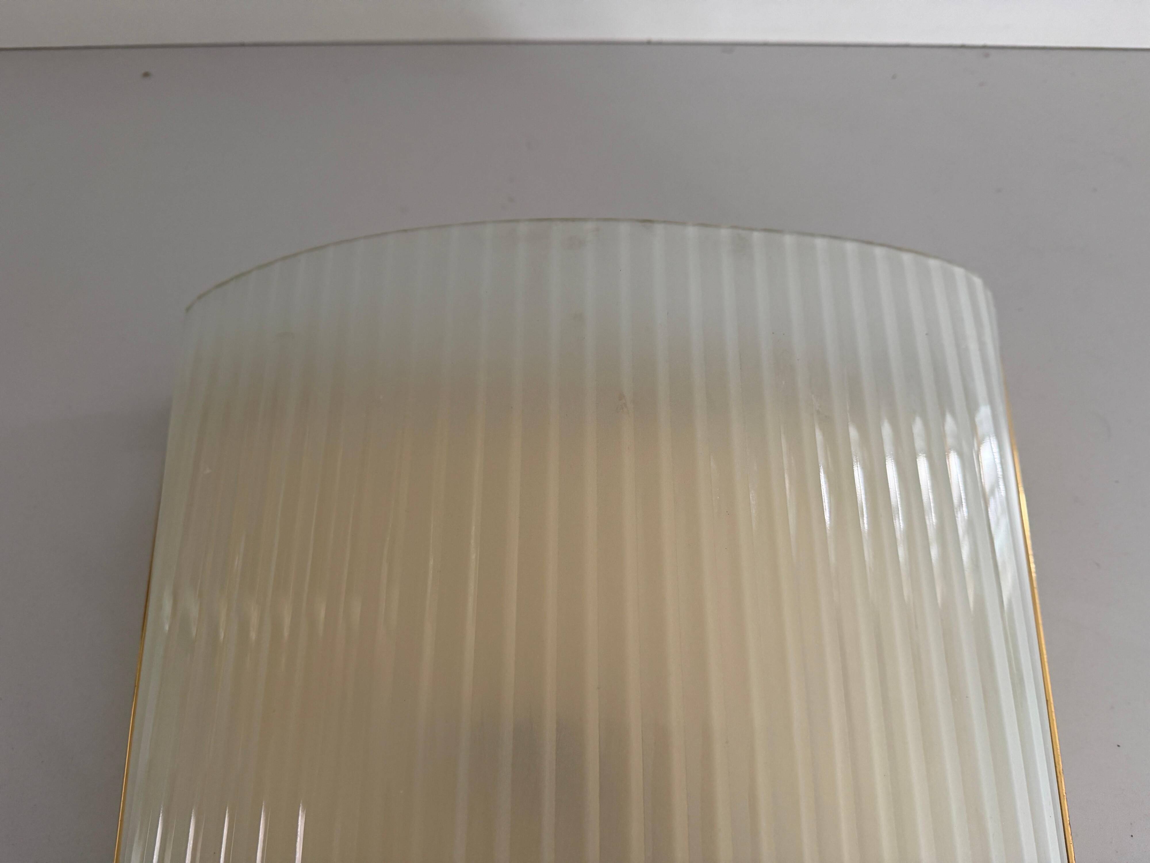 Large heavy glass wall light with a brass frame from the mid-century, 1950s, Italy.