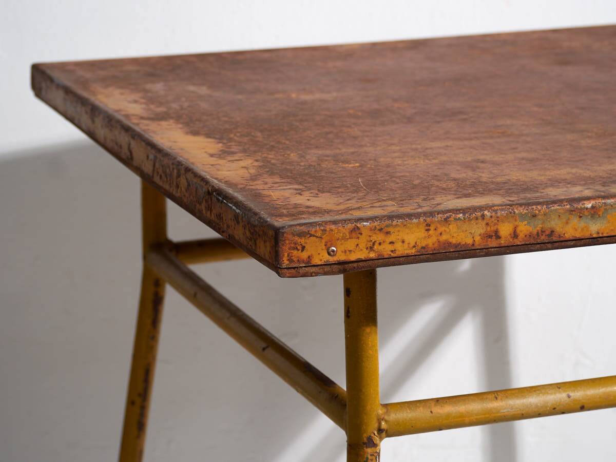 Antique ochre-colored outdoor table (c.1920)