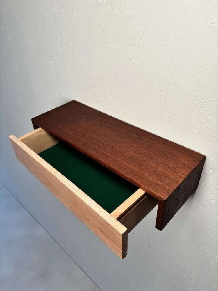 Vintage floating commode in teak and beech wood from the 1960s.