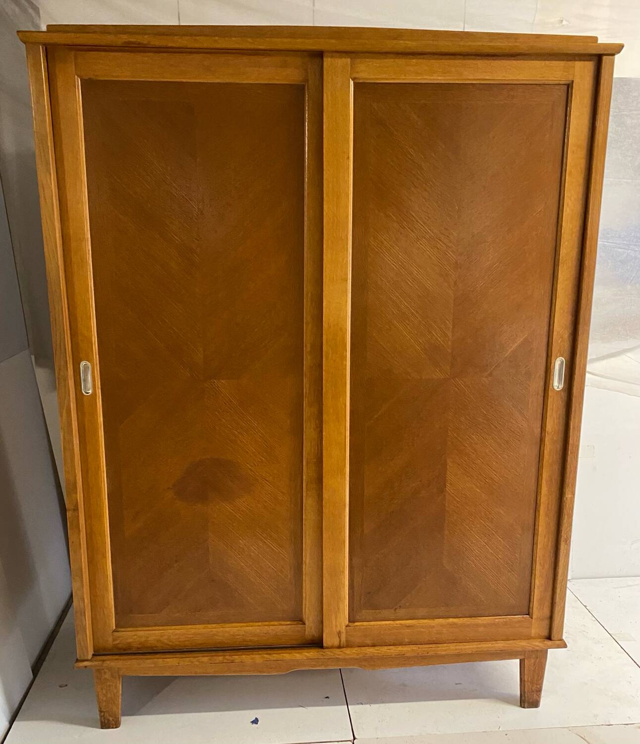 Vintage wardrobe with compass feet, sliding doors