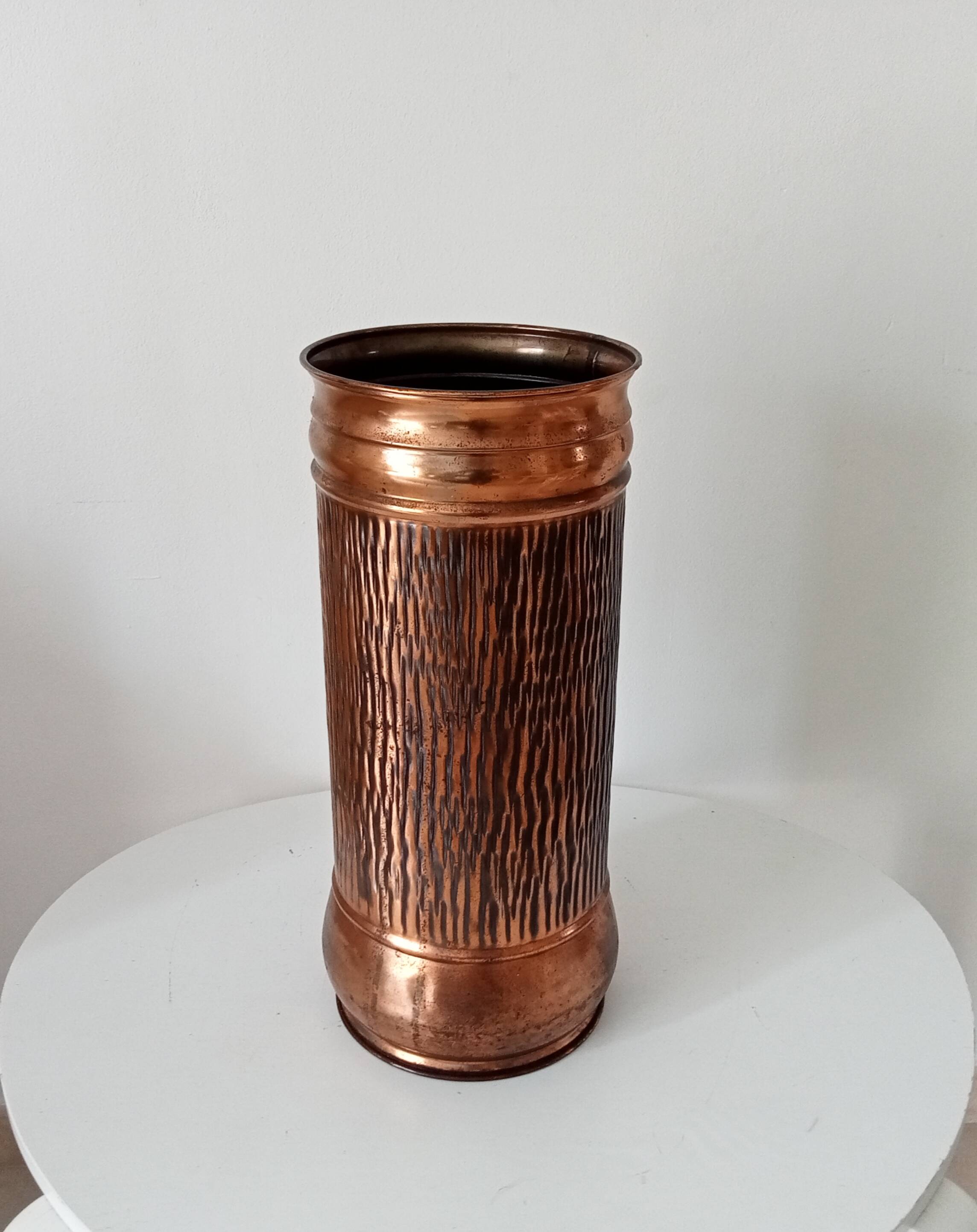 Vintage brutalist umbrella stand in hammered copper with a wood effect.