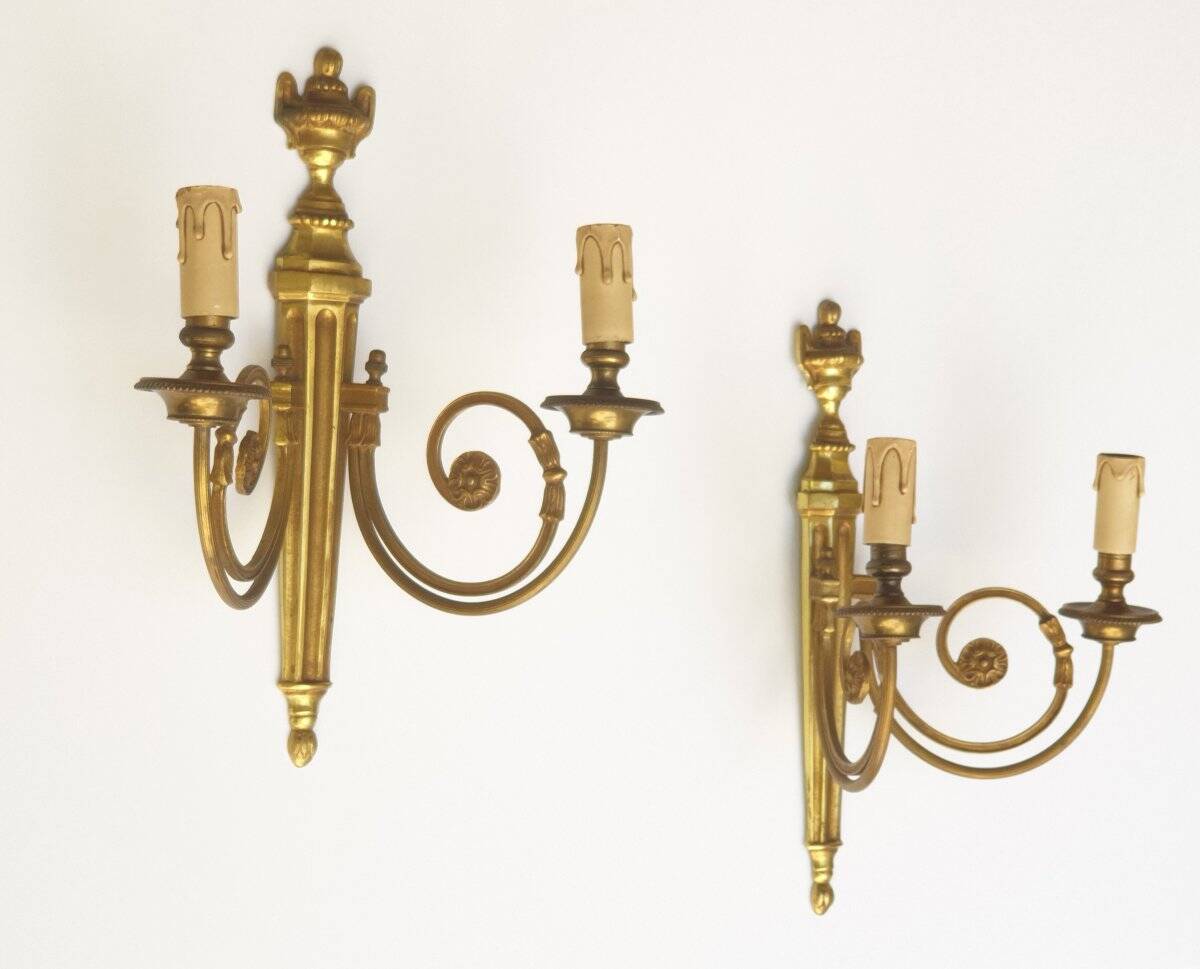 Pair of bronze wall sconces in Louis XVI style