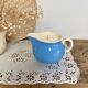Natural soy wax candle and Villeroy & Boch heather creamer