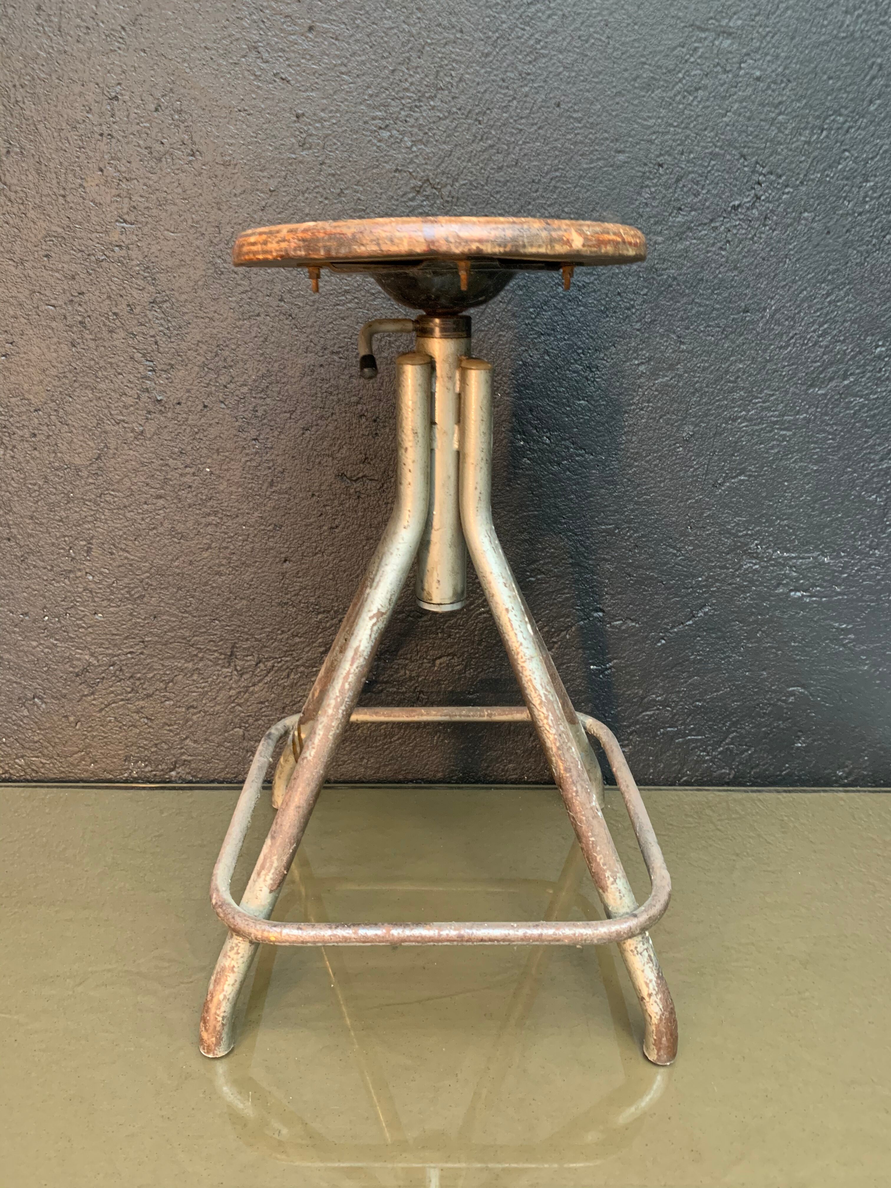 Old adjustable workshop stool