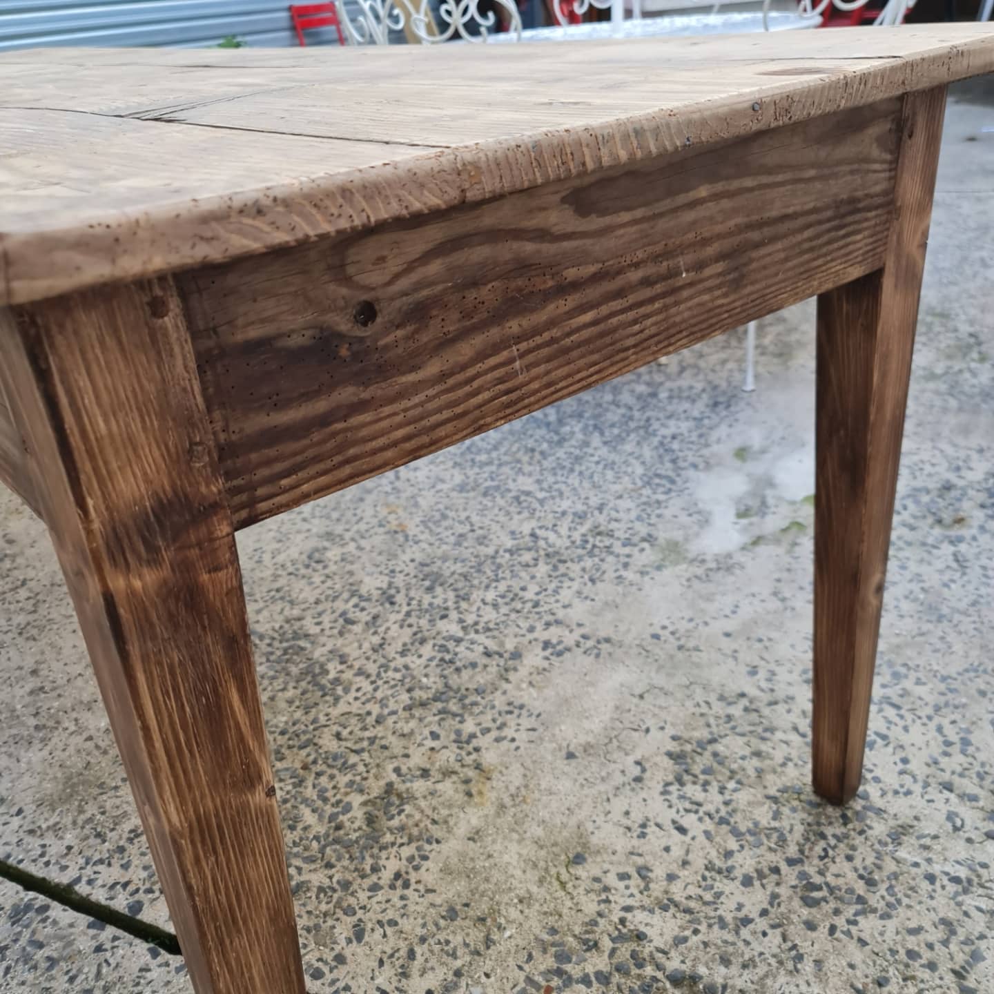 Large antique farmhouse table with a drawer